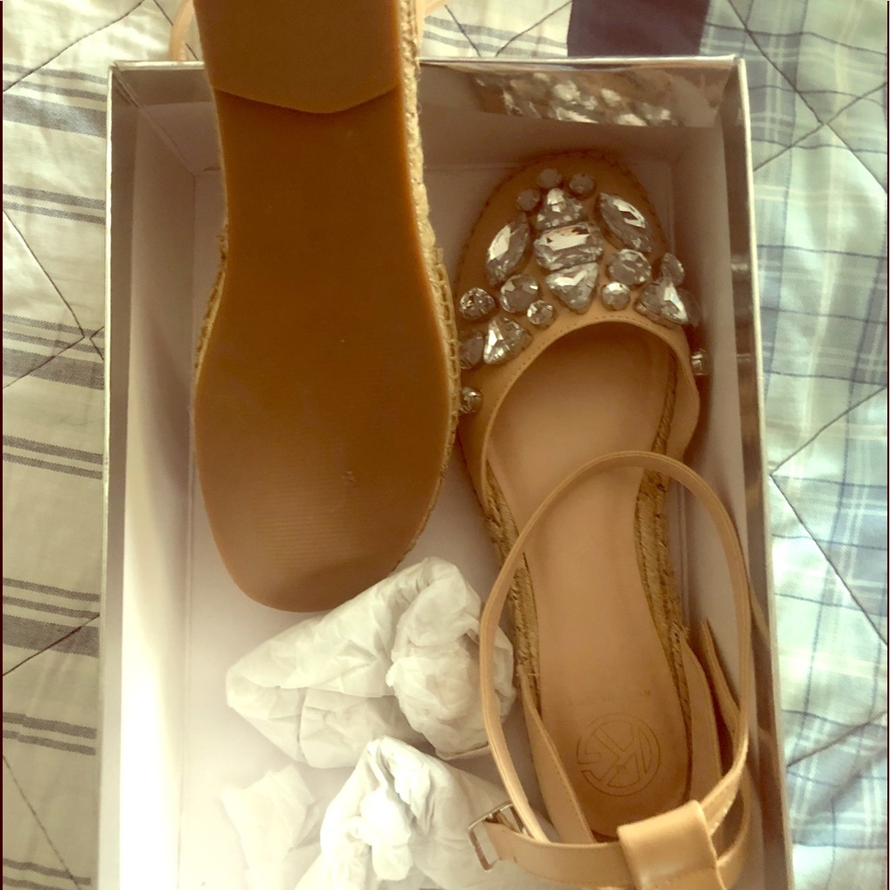 2 pair of flat Sandals.